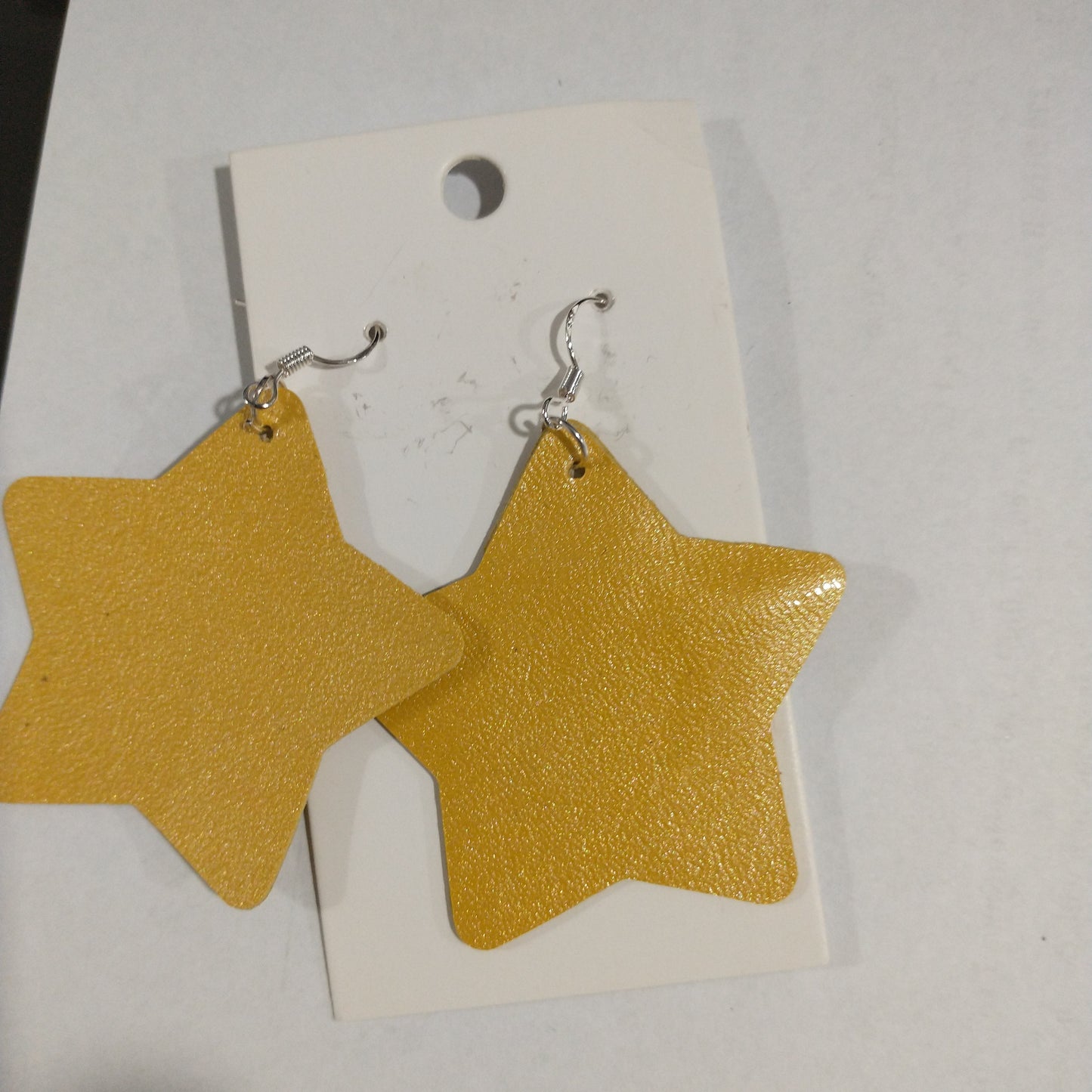 Medium Star Leather Earrings